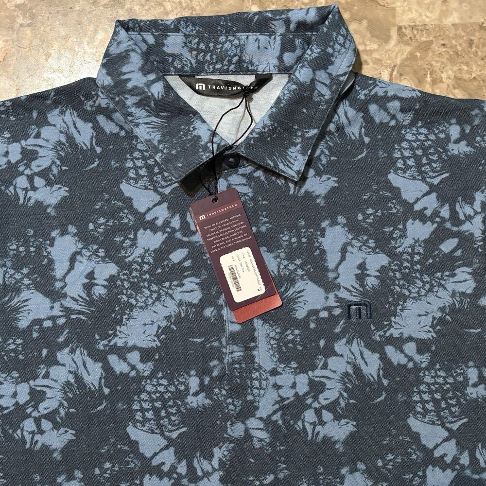 Travis Mathew Polo Shirt Mens Medium Blue Floral Hawaiian Featherweight Golf NEW